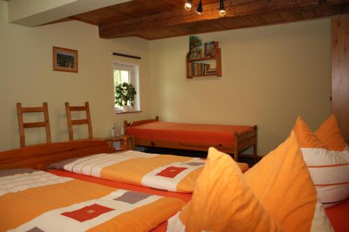 En eller flere senge i et værelse på Dobrahof - Wohnung 1