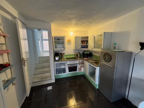 Kuchyň nebo kuchyňský kout v ubytování Casa - Dias de Verano