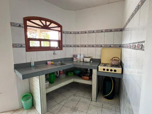 Kuchyň nebo kuchyňský kout v ubytování Hostal Neptuno - Poseidon