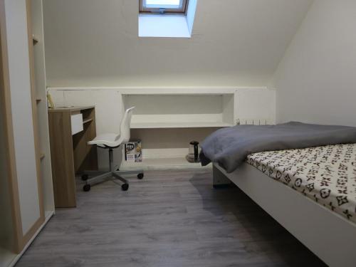 Postel nebo postele na pokoji v ubytování Chambre Blanche