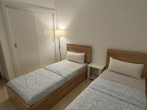 Кровать или кровати в номере Elegante apartamento con dos terrazas en el Centro