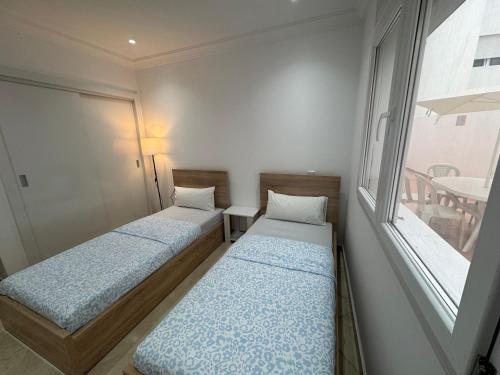 Кровать или кровати в номере Elegante apartamento con dos terrazas en el Centro