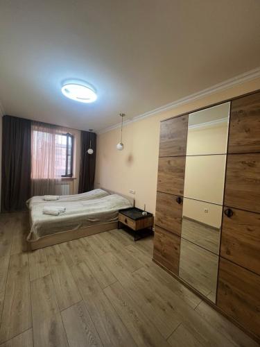 Ένα ή περισσότερα κρεβάτια σε δωμάτιο στο Cozy Appartement near Park