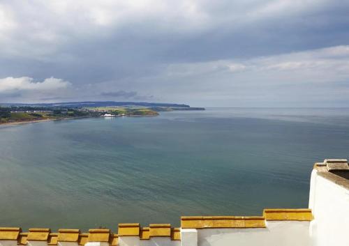a view of a large body of water at Castle By The Sea Scarborough in Scarborough