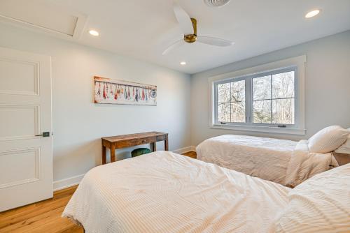 a bedroom with two beds and a window at Lakeside Home Near Mammoth Cave and Nolin Lake! in Cub Run