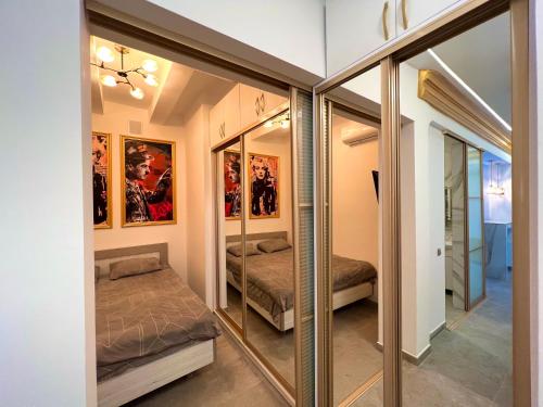 Ένα ή περισσότερα κρεβάτια σε δωμάτιο στο City Center Apart