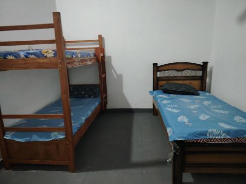 Postel nebo postele na pokoji v ubytování Quinta Manel