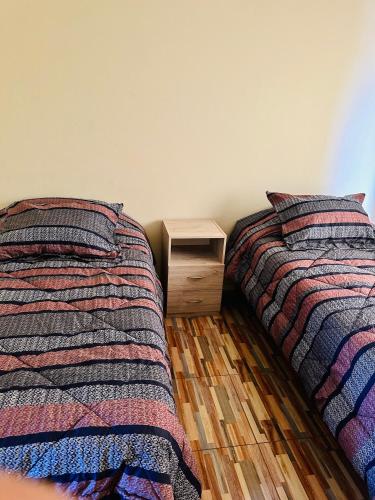 Postel nebo postele na pokoji v ubytování Departamento amoblado calama