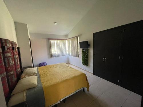 Una cama o camas en una habitación de your best choice in oaxtepec