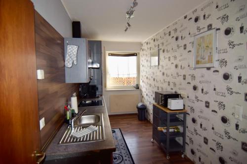 Kuchyň nebo kuchyňský kout v ubytování Ferienwohnung Kulmbach