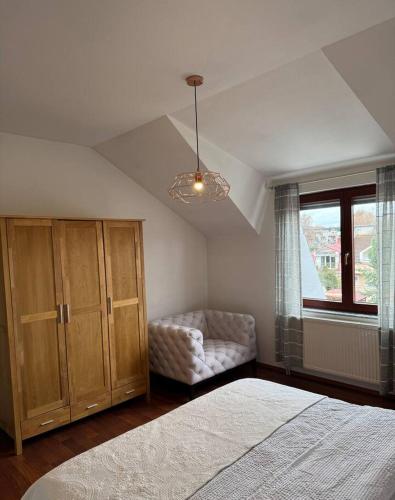 Postel nebo postele na pokoji v ubytování De Luxe Villa