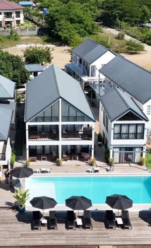 an aerial view of a resort with a swimming pool at Natalna Boutique Home in Bacnotan