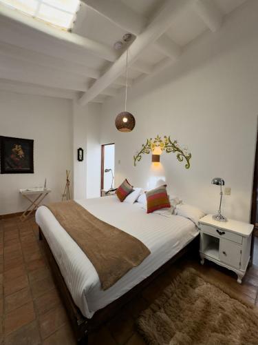 Una cama o camas en una habitación de Andean Wings Valley