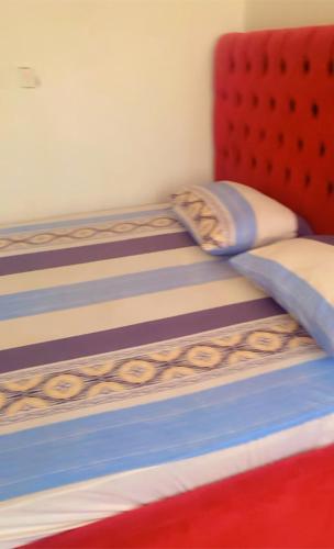 Llit o llits en una habitació de Duplex