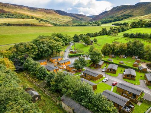 an aerial view of a village in the hills at Lakeside Pods - pets welcome in Oldham