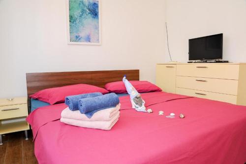 Ένα ή περισσότερα κρεβάτια σε δωμάτιο στο Apartman Ksenija