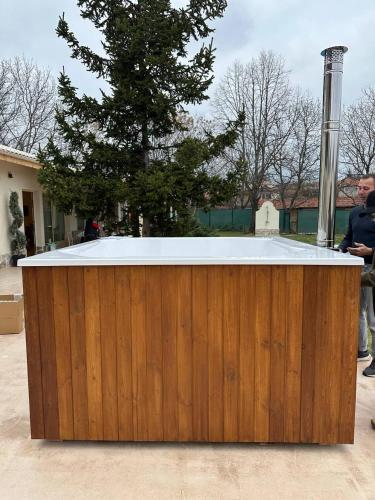 a wooden fence with snow on top of it at Villa Alma 1910 Starosel in Starosel