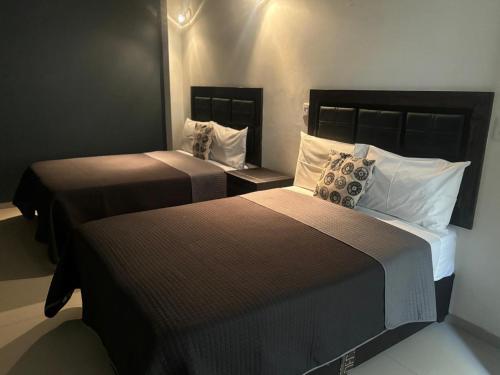 Postel nebo postele na pokoji v ubytování SOFIA Hotel