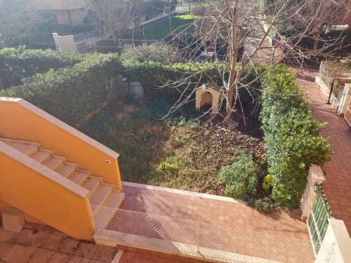 an overhead view of a garden with a staircase at A casa di Gio e Fede in Rimini