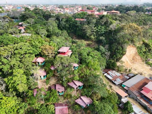 an overhead view of a village in the forest at Refugio Ecolodge Shapingo in Moyobamba