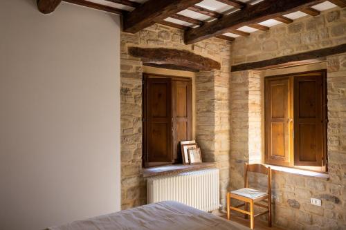 Postel nebo postele na pokoji v ubytování Casa Santo Stefano