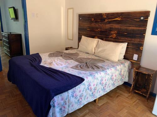 Katil atau katil-katil dalam bilik di Hotel Miguel Pereira