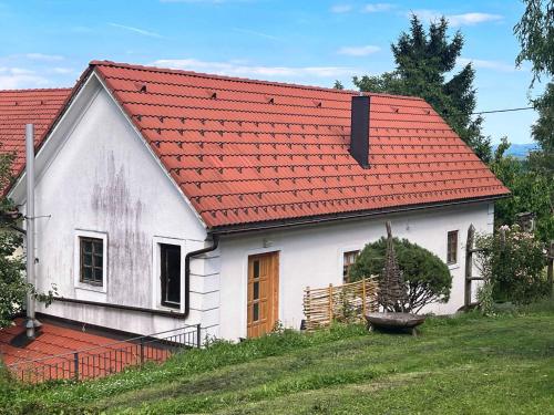 a small white house with an orange roof at Holiday home in Semic - Kranjska (Krain) 51757 in Semič