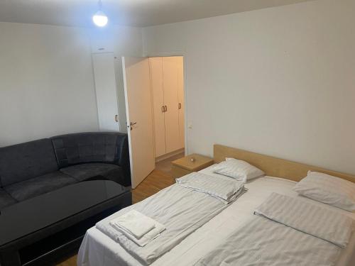 a living room with two beds and a couch at Studio in Oskarshamn