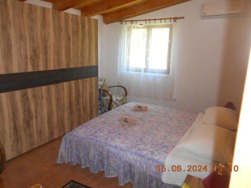Postel nebo postele na pokoji v ubytování Holiday house with a parking space Babici, Umag - 13795