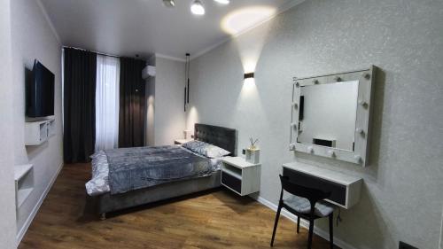 Postel nebo postele na pokoji v ubytování Avram Iancu Centru Stay