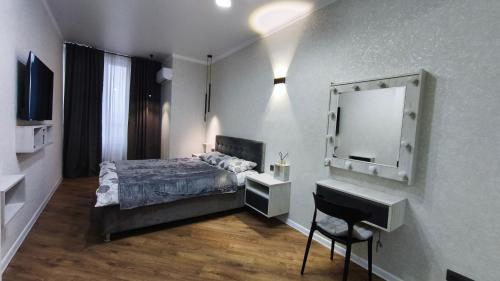 TV a/nebo společenská místnost v ubytování Avram Iancu Centru Stay