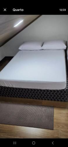 a close up of a mattress on a bed frame at Casa de maurinho in Ouro Preto