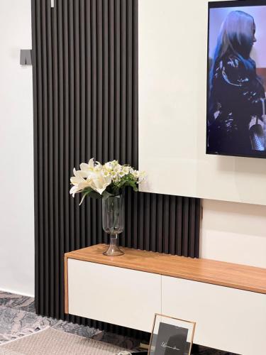 Μια τηλεόραση ή/και κέντρο ψυχαγωγίας στο Valley Luxe Nook