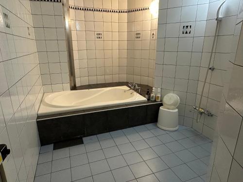 Koupelna v ubytování ホテルロサージュ