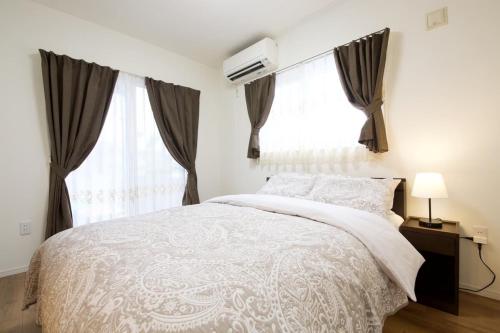 Katil atau katil-katil dalam bilik di MIWA House