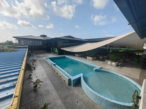 an overhead view of a swimming pool on a building at Royal International Hotel & Mall in Georgetown