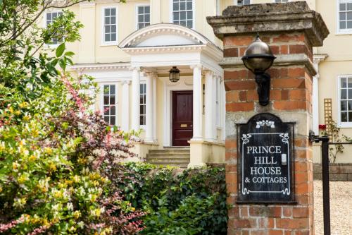 a house with a sign in front of it at Prince Hill House in Devizes