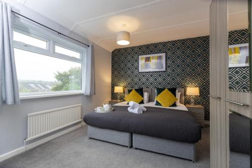 Postel nebo postele na pokoji v ubytování Taylor House, Durham