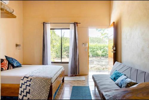 Postel nebo postele na pokoji v ubytování Apartamento Entero El Guanacaste con Piscina