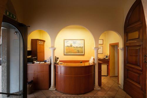 a large room with a large tub in a building at Hotel Eden in Florence