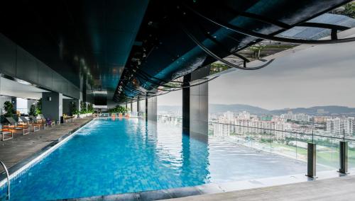 a swimming pool on the roof of a building at Mcity at Jalan Ampang in Kuala Lumpur