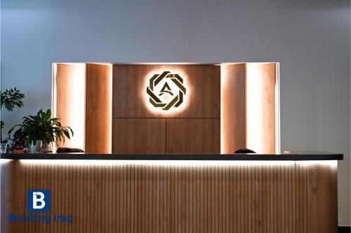 a podium with a b logo on top of it at Andalus Hotel in Baghdad