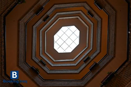 an overhead view of a ceiling with a window at Andalus Hotel in Baghdad