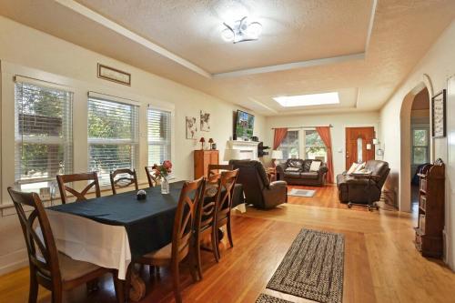 a dining room with a table and chairs at Wine Country Oasis Private Pool & Spa in Acampo