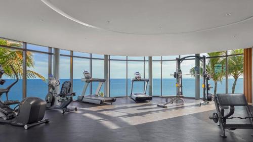 a gym with a view of the ocean at Apartemen IDR Borneo Bay in Klandasan Kecil