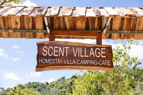 a sign for a event village at a home stay villa camping cafe at Scent Chalet D - Village in Da Lat