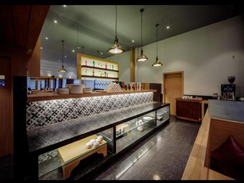 a large room with a counter and a food court at Gopalas Residency Bhumi World Bhiwandi in Bhiwandi