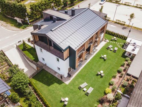 an aerial view of a house with a yard at Ariane's Guesthouse in Sesto