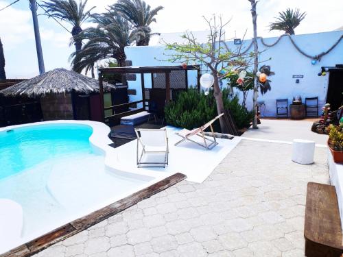 Swimmingpoolen hos eller tæt på Finca Lucía - El Pequeño Edén