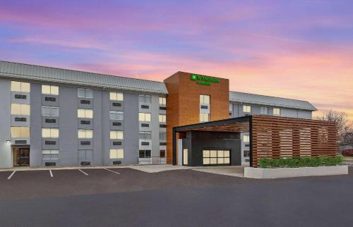 a rendering of a hotel with a building at Wyndham Garden Louisville KY in Louisville